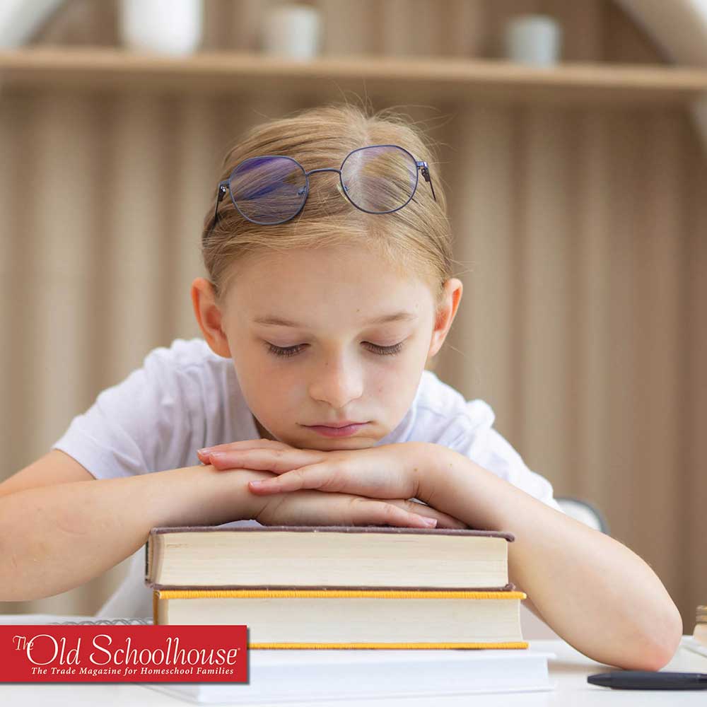 a girl who is a reluctant reader looking defeated with her hands and head propped up on a stack of three hardcover books